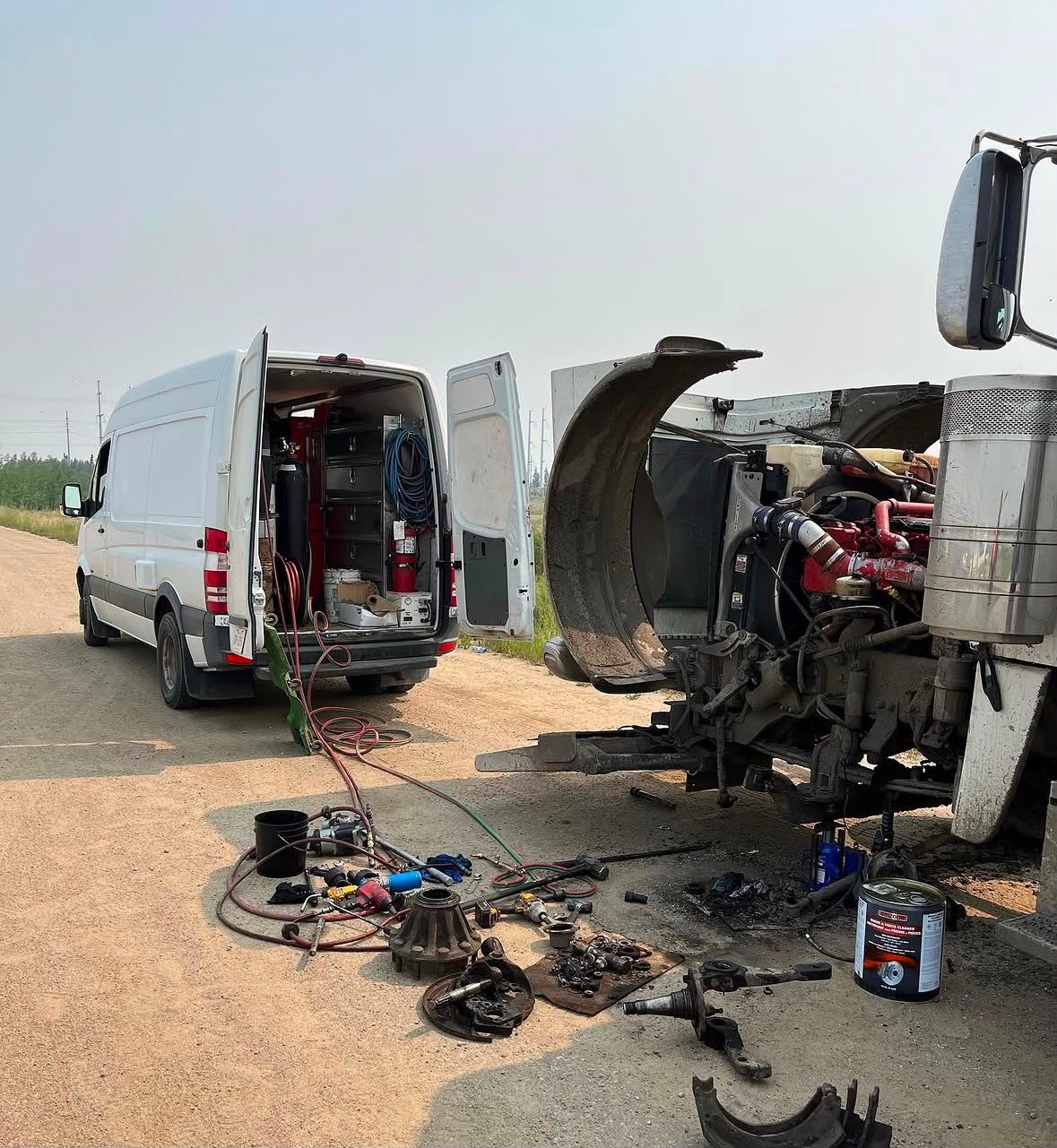 Mechanic checking a heavy truck engine